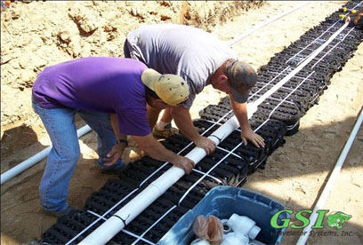 installing orifice distribution assemblies GSI is your source for septic system repair in Northeast Georgia