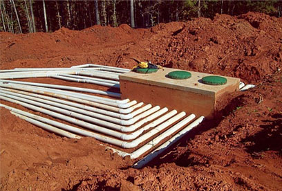 28 hole distribution box with lateral lines (left angle view) GSI provides full service septic tank repair and septic system maintenance