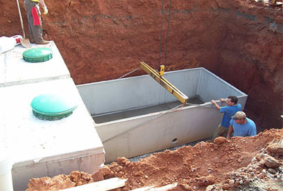 leveling lower portion of 3000 gallon tank GSI provides full service septic tank repair and septic system maintenance